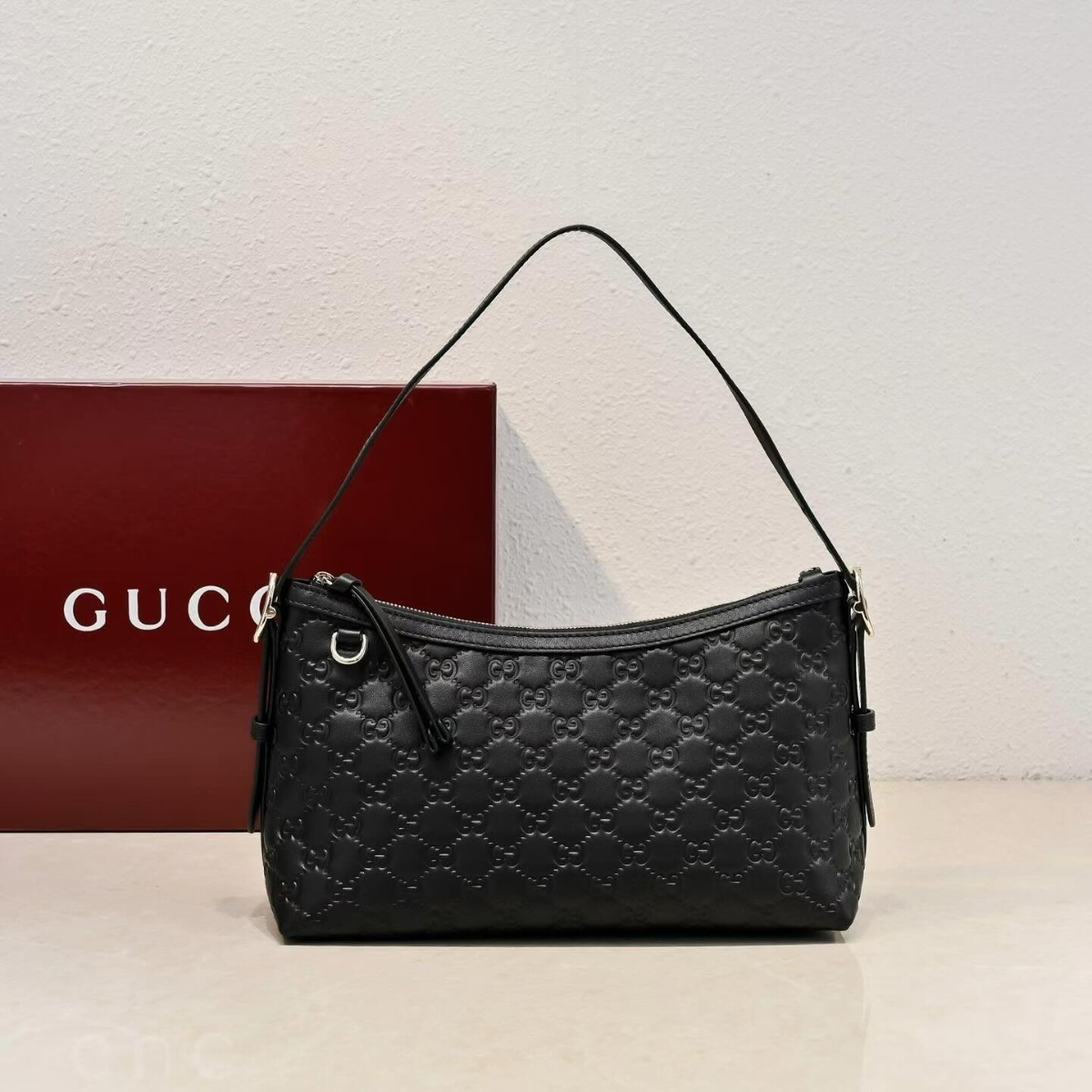 MEDIUM GG EMBLEM SHOULDER BAG GUCCI