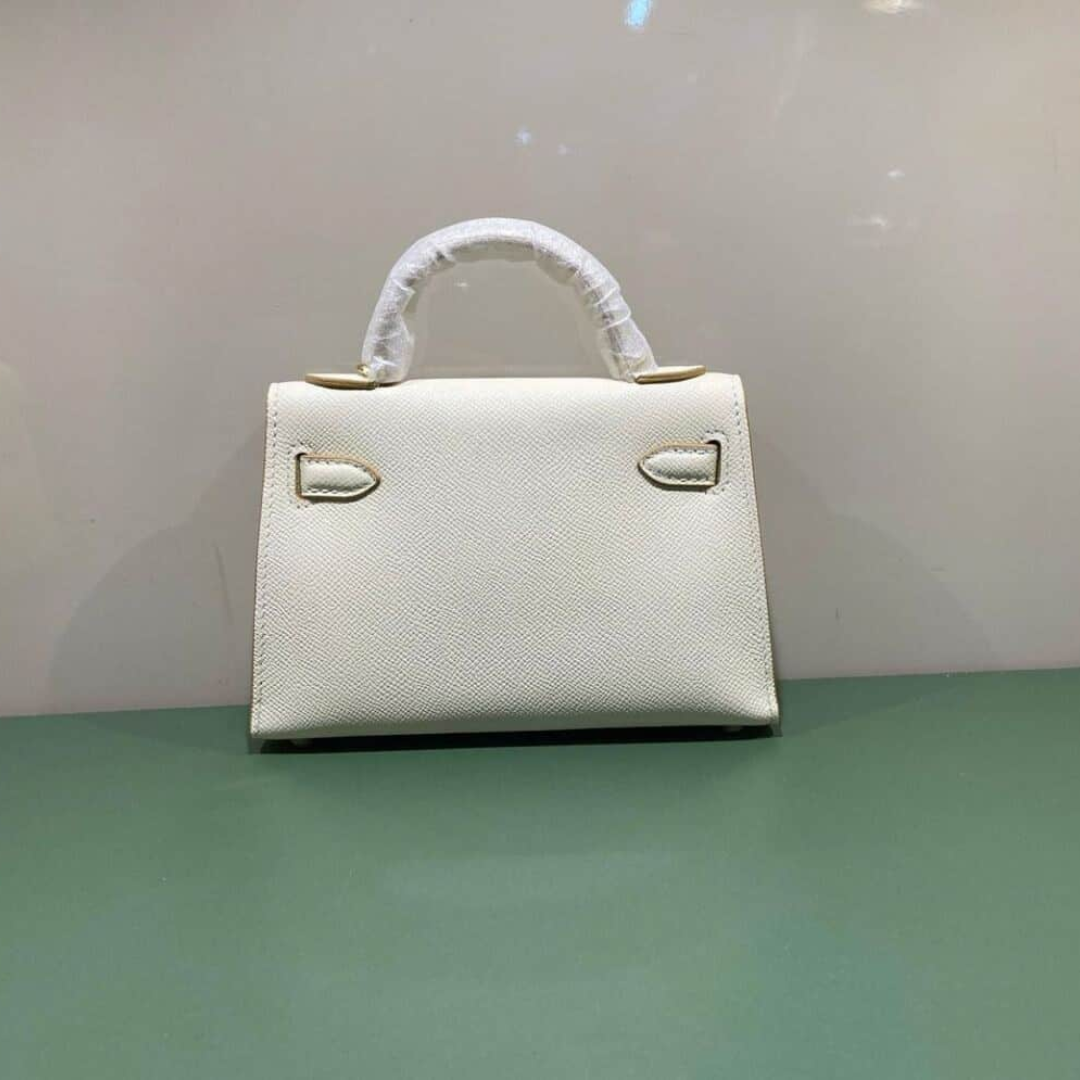 HERMÈS KELLY 20 BAG WITH GOLD HARDWARE IN OFF-WHITE